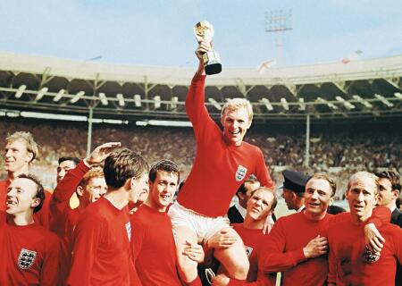 England captain Bobby Moore hoists the Jules Rimet trophy follwoing England's win over West Germany in 1966